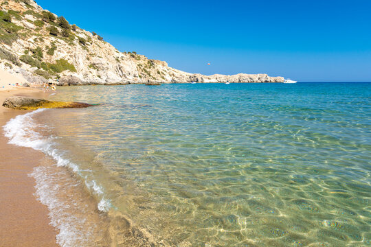 crystal clear water on Tsambika beach in Rhodes island Greece