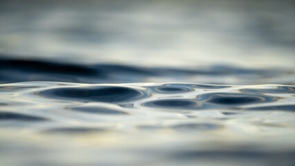 Light reflection in the rippled water surface