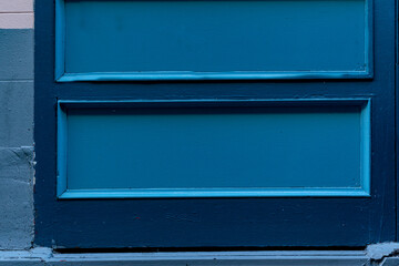 part of old weathered wooden blue door