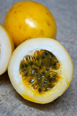 Passion fruits on granite background