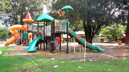 Empty child's playground jungle gym, panning left to right