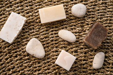 Natural eco friendly solid shampoo bar, conditioner or soap laying on wooden background. Zero waste and sustainable plastic free lifestyle