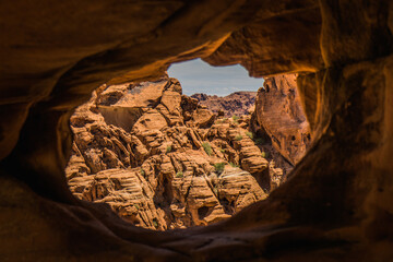 Typical arid and colorful landscape of the Valley of Fire in Nevada. Taken through geological formations