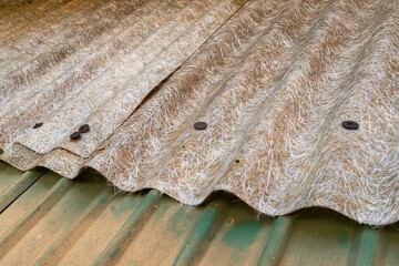old fiberglass and metal corrugated roofing