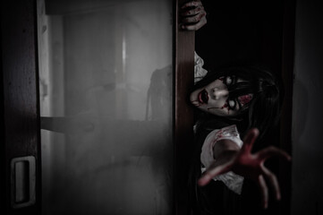 Portrait of asian woman make up ghost,Scary horror scene for background,Halloween festival...