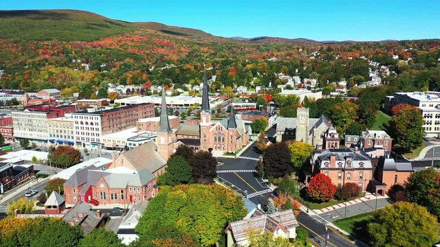 Aerial View of Downtown North Adams, Massachusetts USA. First Baptist Church and Public Library on Sunny Autumn Day, Orbit Drone Shot