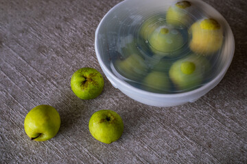 Apples packed with environmentally safe round silicone stretch lid ready for storage. Reusable eco-friendly kitchen products. Zero waste sustainable plastic free lifestyle