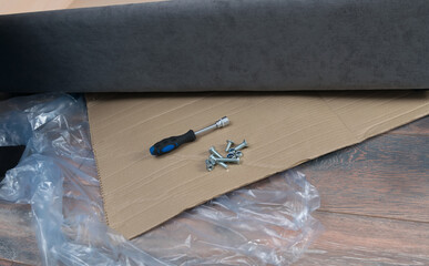 on the packaging materials, cardboard and polyethylene, there are several bolts and a key for...