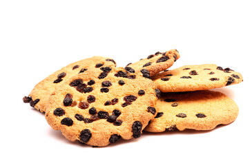 Big round cookies with raisins on a white background