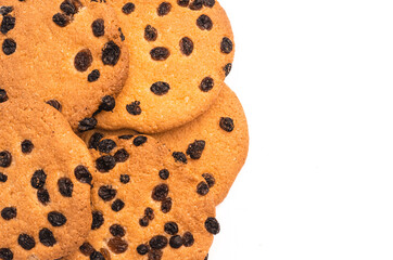 Close up of big round cookies with raisins on a white background. Place for text