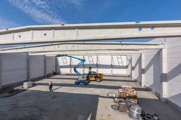 Warehouse construction with industrial vehicles.