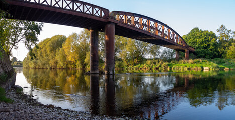 Monmouth Viaduct an old derelict railway viaduct bridge crossing the river Wye in Monmouthshire Wales.