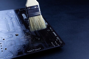 Cleaning the PC cleaning the motherboard from dust using a brush