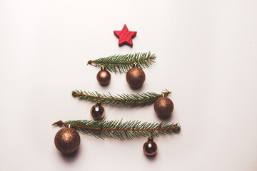 twigs of Christmas tree and toys from straw