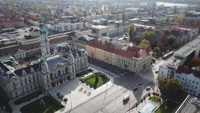Aerial / drone footage of the neo baroque Győr Town Hall in downtown Győr, capital of Győr-Moson-Sopron County, Western Transdanubia region in Norhwestern Hungary