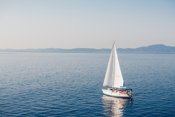 Fototapeta premium Beautiful holidays on a sailboat with morning calm sea.