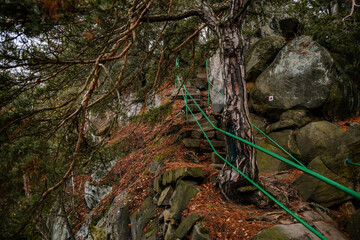 Viewpoint above Jizera valley near castle Vranov, Iron green ladder to the top of the sandstone rocks, Hiking Golden Trail of Bohemian Paradise, Mala Skala, Czech Republic