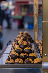 baked chestnuts, chestnuts standing on the counter
