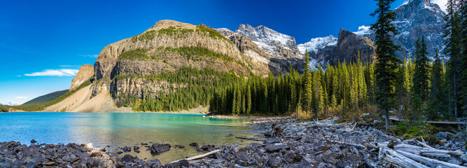 Moraine lake beautiful landscape in summer to early autumn sunny day morning. Sparkle turquoise...