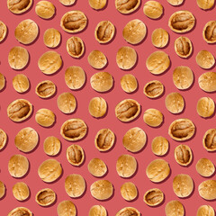 seamless pattern with walnuts on red background