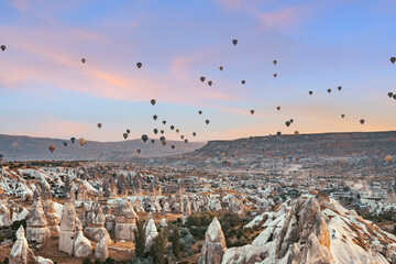Hot air balloon flying over spectacular Cappadocia