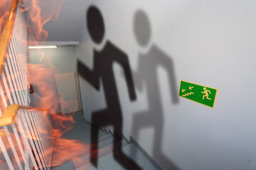emergency exit and person symbol escaping from fire symbol