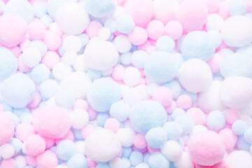 White, pink and blue soft pompons.