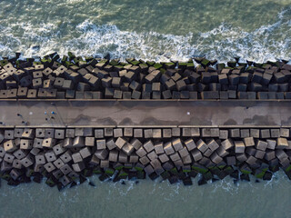 aerial view of a jetty at the entrance of the harbour of Scheveningen