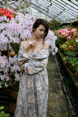 girl in the garden with light flowers