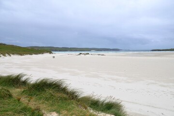 Beautiful empty white sand beach on the Isle of Lewis on a cold windy day in summer, Outer Hebrides, Scotland