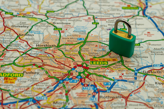 03/18/2020 Portsmouth, Hampshire, UK Leeds UK Shown on a road map or geography map with a padlock on top to represent a city in lock down