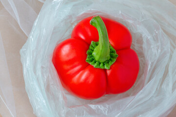 Red peppers in a transparent plastic bag
