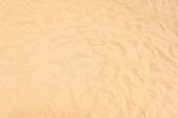 background and texture of sand pattern on a beach in summer