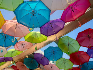 Colored umbrellas hanging