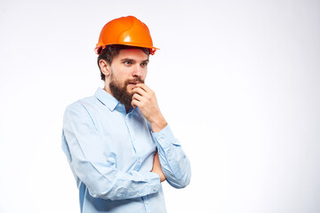 Worker man in orange paint engineer emotions industry construction