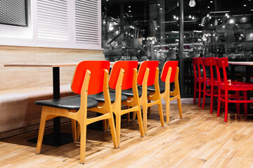 Cafeteria or canteen interior. School cafeteria. Factory canteen with chairs and tables, nobody. Modern cafeteria interior. Clean canteen in modern school. Lunch room.