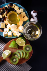 Dinner for two with white wine, cheese, honey and fruit