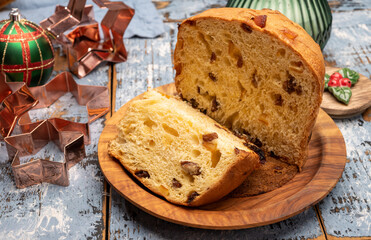 Christmas food, fresh Italian panettone cake made from yeast dough with dried fruits