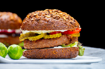 Grilled plant based, meat free vega burgers close up