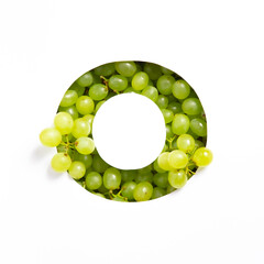 Letter O of English alphabet of fresh grape and cut paper isolated on white. Typeface of green berries