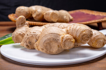 Fresh ginger rhizome root used in traditional medicines and for flavoring meals worldwide.