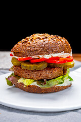 Grilled plant based, meat free vega burgers close up
