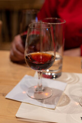 Professional tasting of different fortified dessert ruby, tawny port wines in glasses in porto cellars in Vila Nova de Gaia, Portugal