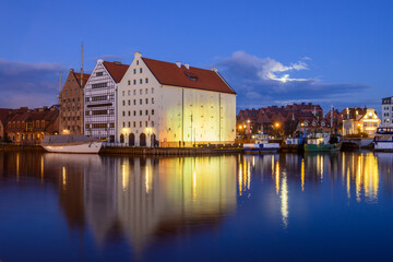 Motlawa River and beautiful architecture of Gdansk at night. Poland