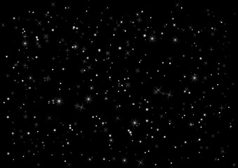 Stars and sparkles on a black background