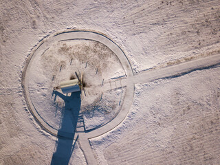 aerial top view windmill in the snow winter.