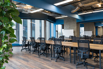 Modern office space with tables and chairs