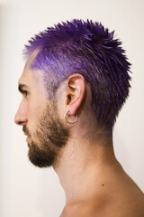 Boy dyeing his hair purple