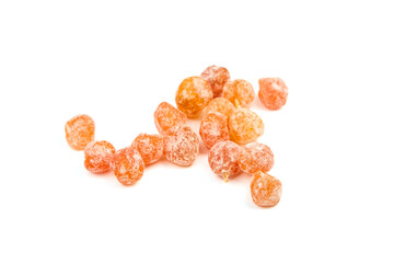 Dried fruits, heap of candied kumquats isolated on white background