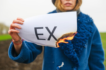 Burning fire on paper with Ex word